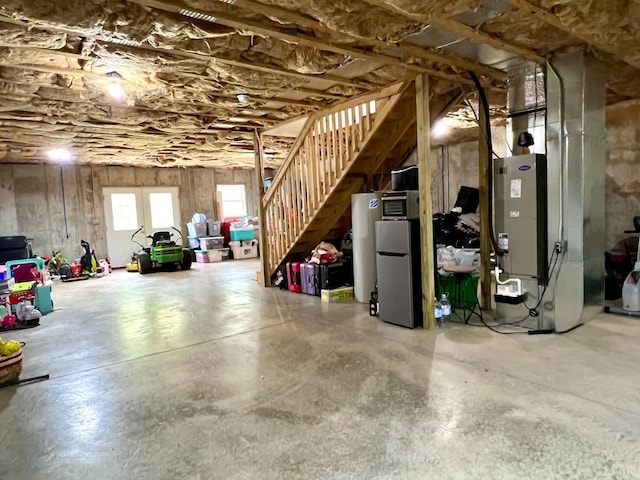605 Beeks Ln, Spout Spring, VA 24593 - basement with water heater, stairs, and freestanding refrigerator