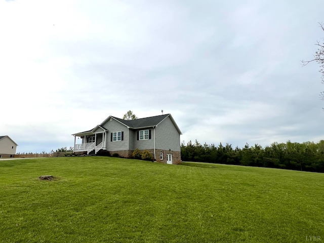 605 Beeks Ln, Spout Spring, VA 24593 - view of front facade featuring a front yard and covered porch