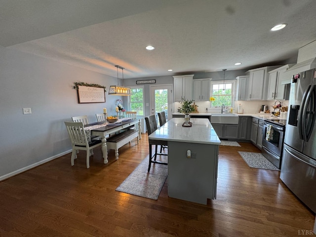 605 Beeks Ln, Spout Spring, VA 24593 - kitchen featuring stainless steel appliances, a kitchen island, hanging light fixtures, recessed lighting, and dark wood finished floors