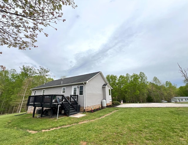605 Beeks Ln, Spout Spring, VA 24593 - back of property with a wooden deck and a lawn