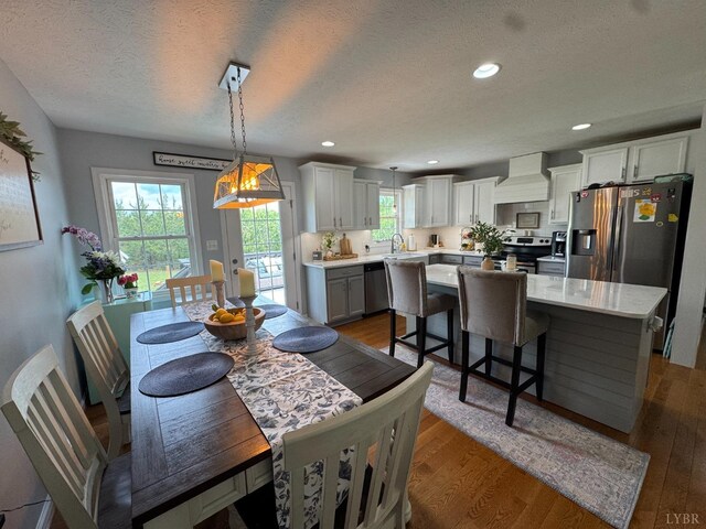 605 Beeks Ln, Spout Spring, VA 24593 - dining space featuring a textured ceiling, dark wood-style floors, and recessed lighting
