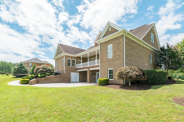 126 Golf Course Trl, Amherst, VA 24521 - rear view of property featuring brick siding, a patio area, and a lawn