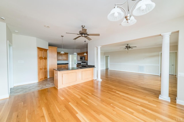 126 Golf Course Trl, Amherst, VA 24521 - kitchen featuring decorative columns, ceiling fan, light wood finished floors, and open floor plan