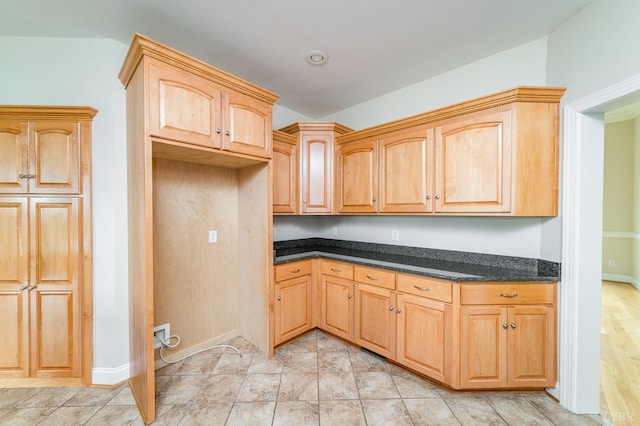 126 Golf Course Trl, Amherst, VA 24521 - kitchen with baseboards and dark stone counters