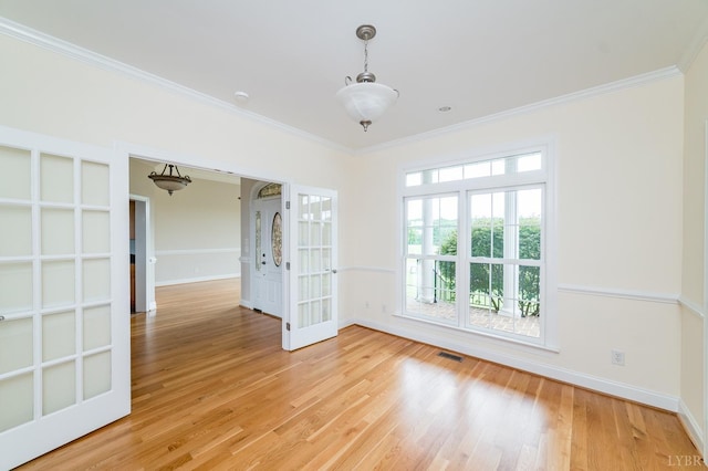 126 Golf Course Trl, Amherst, VA 24521 - spare room featuring ornamental molding, baseboards, and light wood-style flooring