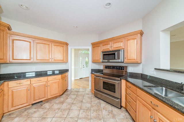 126 Golf Course Trl, Amherst, VA 24521 - kitchen with appliances with stainless steel finishes, dark stone countertops, and recessed lighting