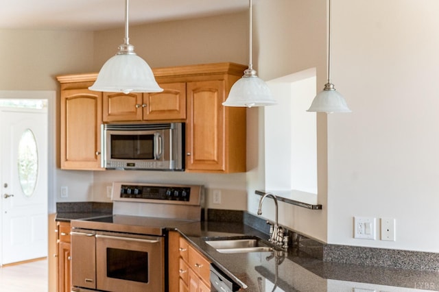 126 Golf Course Trl, Amherst, VA 24521 - kitchen featuring stainless steel appliances, a sink, pendant lighting, and dark stone counters