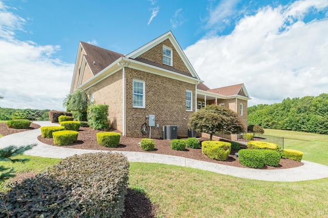 126 Golf Course Trl, Amherst, VA 24521 - view of home's exterior featuring brick siding and a yard