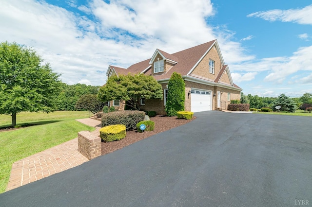 126 Golf Course Trl, Amherst, VA 24521 - view of front of property featuring driveway, an attached garage, a front yard, and brick siding