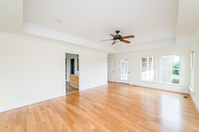 126 Golf Course Trl, Amherst, VA 24521 - empty room featuring a raised ceiling, light wood-type flooring, ceiling fan, and ornamental molding
