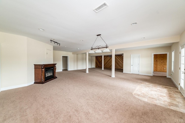 126 Golf Course Trl, Amherst, VA 24521 - unfurnished living room featuring light carpet, a glass covered fireplace, and recessed lighting