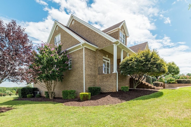 126 Golf Course Trl, Amherst, VA 24521 - view of side of property featuring stairway, brick siding, a lawn, and a porch