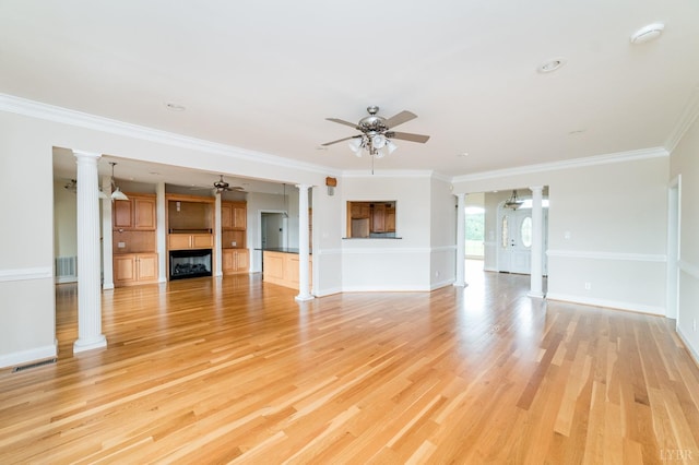 126 Golf Course Trl, Amherst, VA 24521 - unfurnished living room featuring ornate columns, ceiling fan, a fireplace, crown molding, and light wood-style floors