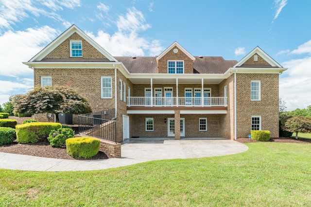 126 Golf Course Trl, Amherst, VA 24521 - rear view of house with a lawn, a patio area, and brick siding