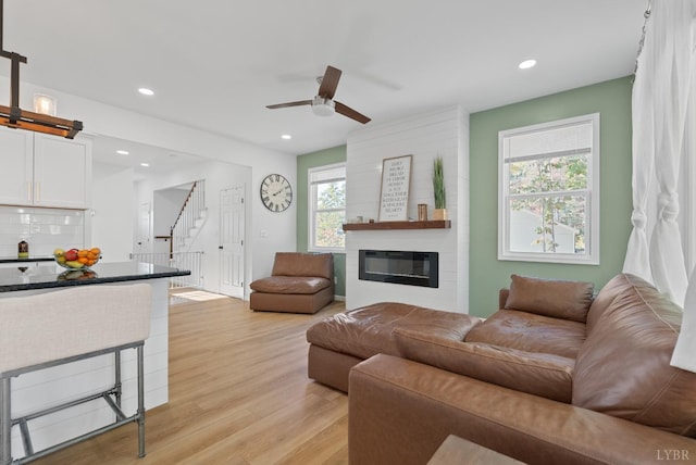 71 Patrick Ct, Madison Heights, VA 24572 - living room with stairs, light wood-type flooring, healthy amount of natural light, a ceiling fan, and recessed lighting
