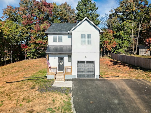 71 Patrick Ct, Madison Heights, VA 24572 - view of front of home featuring a standing seam roof, an attached garage, driveway, roof with shingles, and metal roof