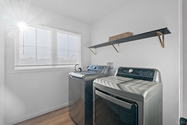 71 Patrick Ct, Madison Heights, VA 24572 - laundry room featuring independent washer and dryer, light wood-type flooring, and baseboards
