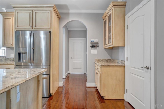1037 Deer Hollow Rd, Forest, VA 24551 - kitchen featuring stainless steel refrigerator with ice dispenser, arched walkways, dark wood-style flooring, light stone counters, and baseboards