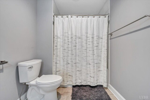 1037 Deer Hollow Rd, Forest, VA 24551 - bathroom with toilet, curtained shower, and baseboards