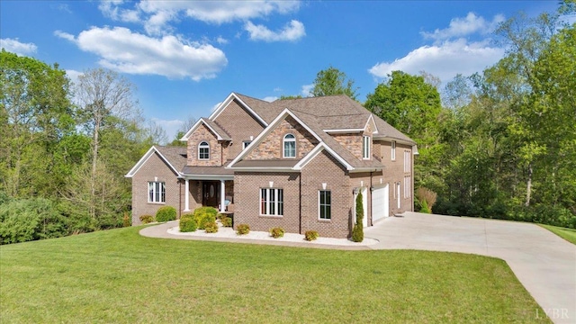 1037 Deer Hollow Rd, Forest, VA 24551 - craftsman house with concrete driveway, a front yard, a garage, and brick siding
