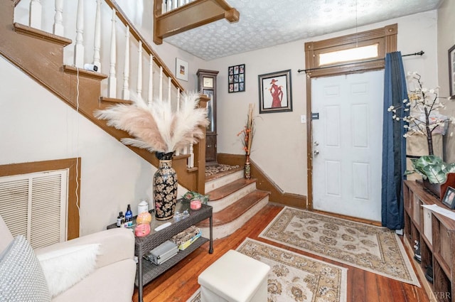 1706 Union St, Lynchburg, VA 24504 - entrance foyer with wood finished floors, stairs, and baseboards