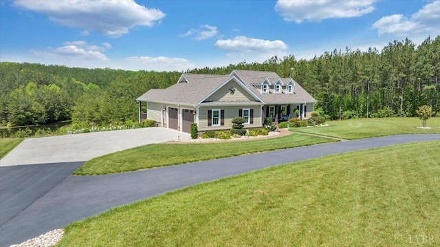 20438 Wyatts Way, Evington, VA 24550 - view of front facade with a wooded view, concrete driveway, a garage, and a front lawn