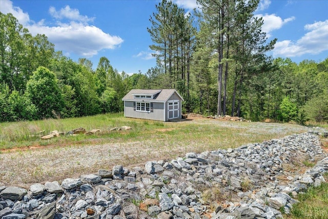 20438 Wyatts Way, Evington, VA 24550 - view of side of property featuring a wooded view and an outdoor structure