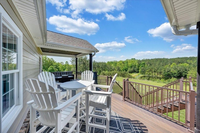 20438 Wyatts Way, Evington, VA 24550 - wooden terrace with a wooded view and outdoor dining space