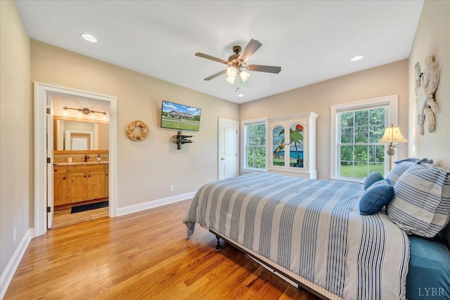 20438 Wyatts Way, Evington, VA 24550 - bedroom with light wood-style floors, baseboards, ceiling fan, recessed lighting, and connected bathroom