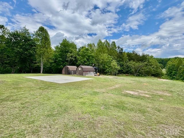 3164 Trent Hatchery Rd, Appomattox, VA 24522 - view of green lawn with a wooded view