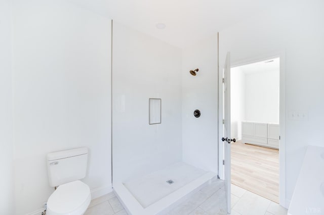 303 Westover Blvd, Lynchburg, VA 24501 - bathroom featuring a shower stall, tile patterned floors, toilet, and baseboards