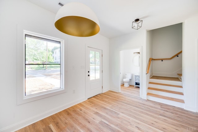 303 Westover Blvd, Lynchburg, VA 24501 - foyer entrance featuring light wood-type flooring, stairs, and baseboards