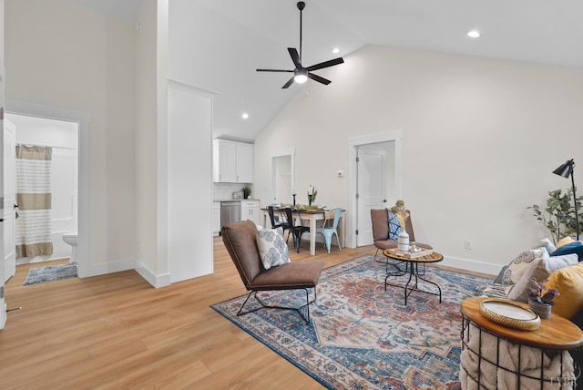 7942 Bear Creek Rd, Gladys, VA 24554 - living area with high vaulted ceiling, ceiling fan, light wood-style flooring, recessed lighting, and baseboards