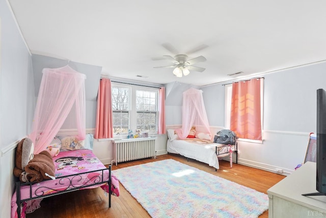 39 N Princeton, Lynchburg, VA 24503 - bedroom with radiator, wood finished floors, and a ceiling fan