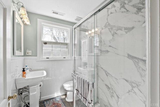 39 N Princeton, Lynchburg, VA 24503 - bathroom featuring a marble finish shower and a wainscoted wall