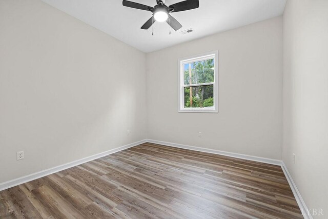2127 Elm St, Lynchburg, VA 24504 - empty room featuring wood finished floors, baseboards, and a ceiling fan