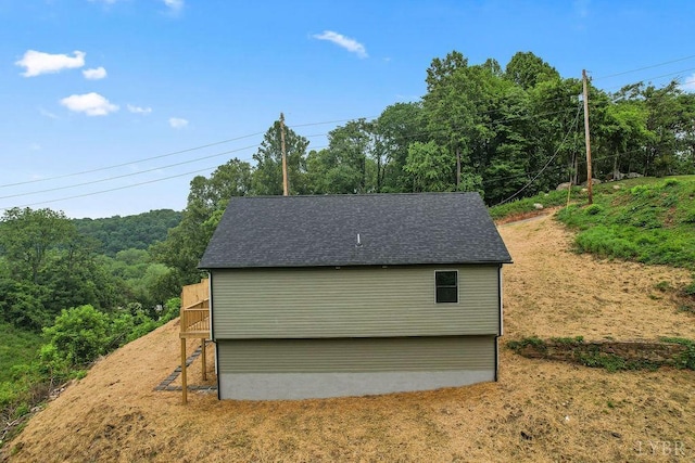 2127 Elm St, Lynchburg, VA 24504 - view of outdoor structure featuring a forest view
