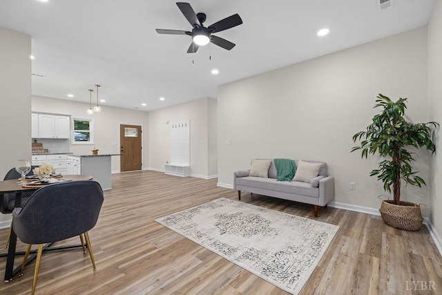 2127 Elm St, Lynchburg, VA 24504 - living area with light wood finished floors, a ceiling fan, baseboards, and recessed lighting