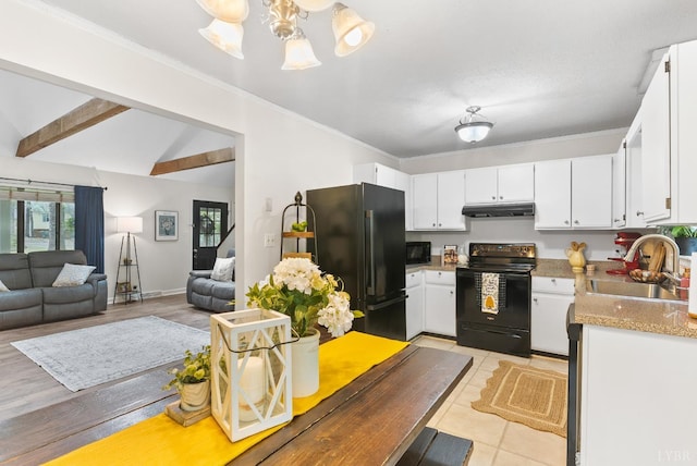 kitchen with black appliances, a sink, under cabinet range hood, open floor plan, and white cabinetry