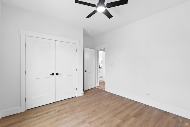 133 Fox Hall Dr, Amherst, VA 24521 - unfurnished bedroom featuring light wood-style flooring, baseboards, a closet, and ceiling fan