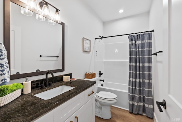 133 Fox Hall Dr, Amherst, VA 24521 - full bath featuring wood finished floors, toilet, vanity, shower / bathtub combination with curtain, and recessed lighting