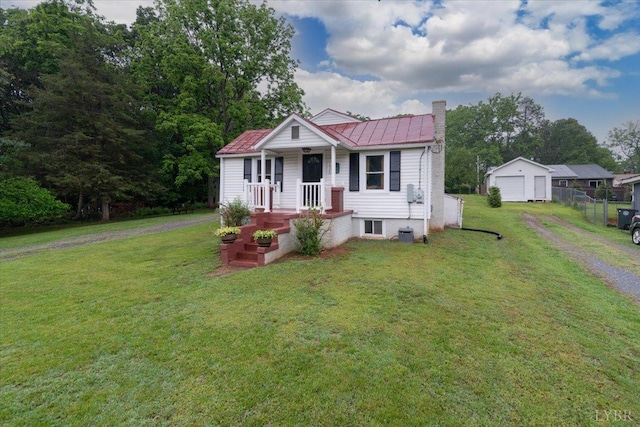 1920 Roxbury St, Lynchburg, VA 24501 - bungalow-style home featuring a garage, driveway, a chimney, and an outbuilding