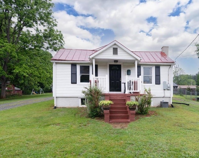 1920 Roxbury St, Lynchburg, VA 24501 - bungalow-style house with a standing seam roof, a metal roof, covered porch, and a chimney