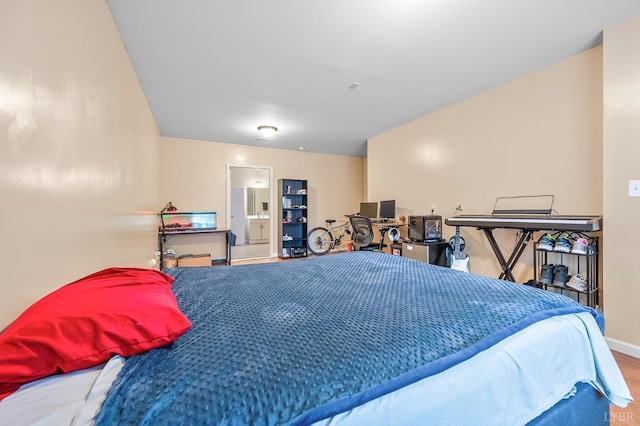 1810 Broadway St Unit 211, Lynchburg, VA 24501 - bedroom with wood finished floors, baseboards, and ensuite bathroom