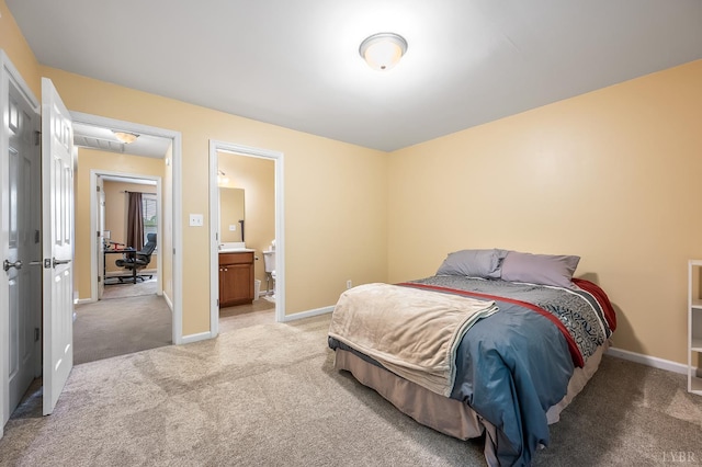 1810 Broadway St Unit 211, Lynchburg, VA 24501 - bedroom featuring light carpet, baseboards, and ensuite bathroom