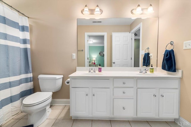 101 Trinity Ct, Lynchburg, VA 24502 - full bathroom with toilet, double vanity, tile patterned floors, and baseboards