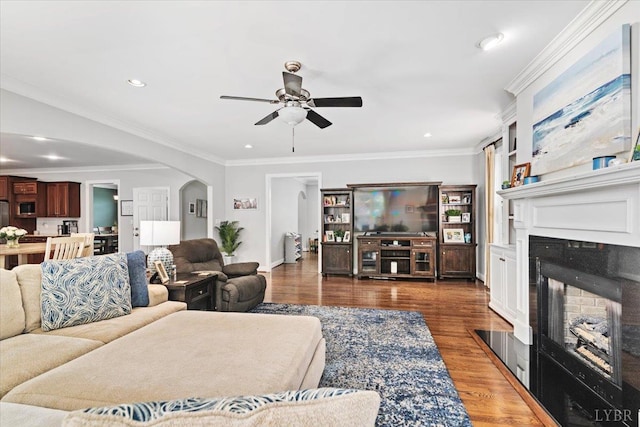 101 Trinity Ct, Lynchburg, VA 24502 - living room featuring arched walkways, a ceiling fan, a high end fireplace, recessed lighting, and wood finished floors