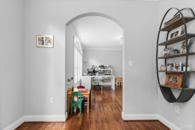 101 Trinity Ct, Lynchburg, VA 24502 - corridor featuring arched walkways, crown molding, a desk, baseboards, and wood finished floors
