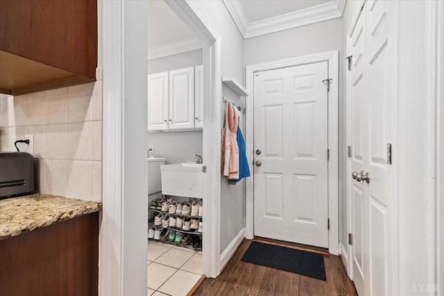 101 Trinity Ct, Lynchburg, VA 24502 - entryway featuring crown molding, dark wood-type flooring, and baseboards