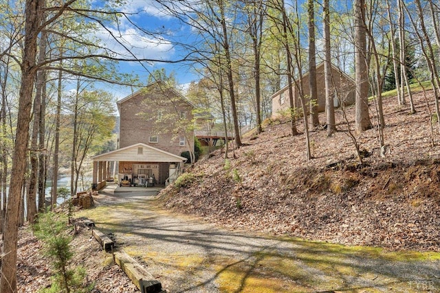806 Cedar Key Ln, Huddleston, VA 24104 - view of front facade featuring a detached carport and gravel driveway